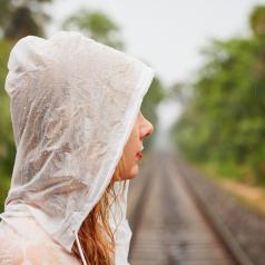 Woman in heavy rain