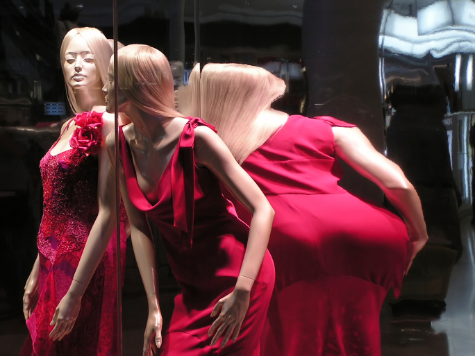 Mannequin distorted in mirror