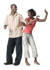 Happy couple bumping hips
