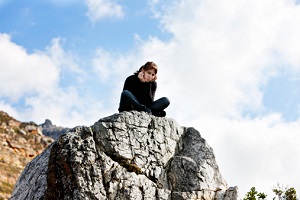 Man leaning against wall