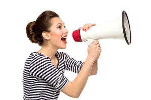 Happy woman with megaphone