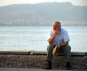 Elderly man thinking