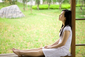 Woman sitting outside