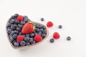 Berries in heart shaped bowl