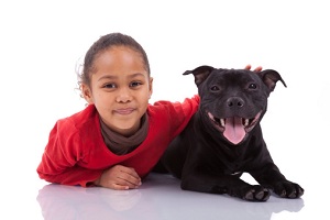 Child with her dog