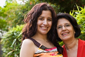 Woman and her mother smiling