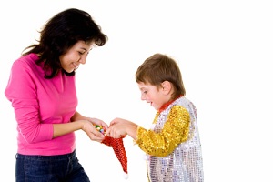 Mother with her child sharing candy