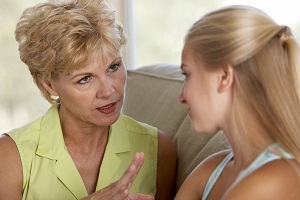 Woman talking with daughter