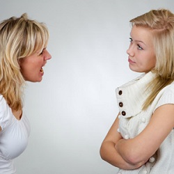 Woman yelling at teen daughter