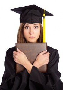 Worried looking graduate holding diploma