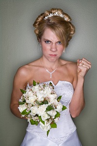 Angry bride with bouquet