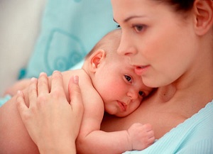 Woman holding newborn