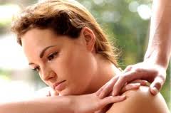 Sad woman with comforting hands on shoulder