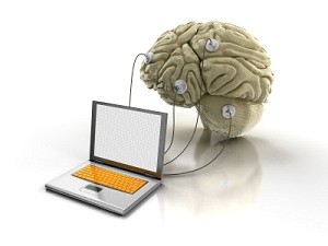 Illustration of brain being monitored by laptop