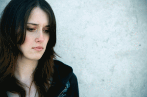 Woman sitting looking sad