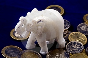 Carved white elephant on coins