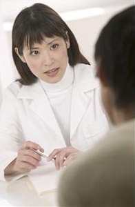 Clinician talking with patient