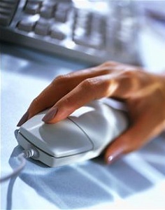 Hand using computer mouse