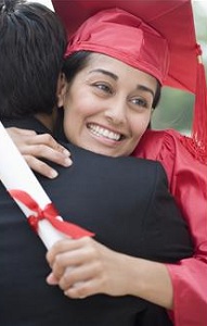 Happy graduate hugging father