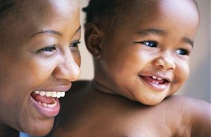 Close up of happy woman and baby