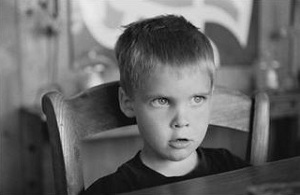 Boy sitting at table