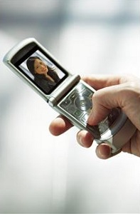 Hand using cell phone