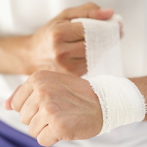 Wrists being bandaged