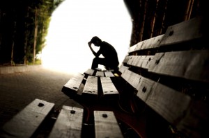 Depressed man on bench