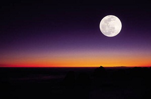 Full moon at sunset
