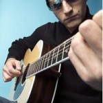 Man playing acoustic guitar