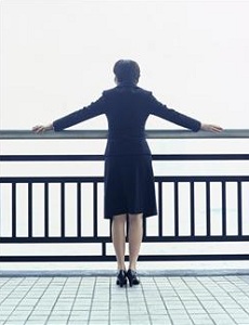 Woman standing at railing
