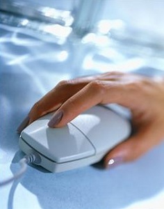 Hand using computer mouse
