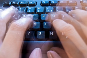 Time lapse of hands typing on keyboard