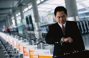 businessman looking at watch