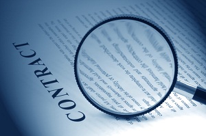 Contract and magnifying glass