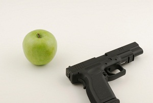Gun and apple