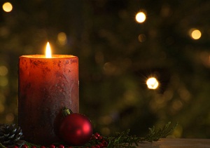 Lit holiday candle