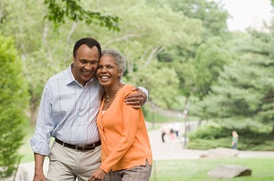 Happy older couple outside