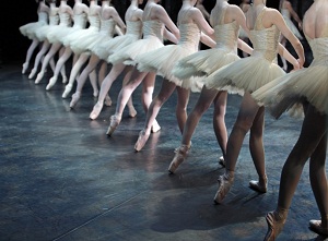Row of ballerinas seen from behind
