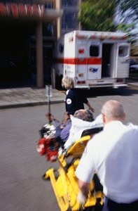 Paramedics moving patient