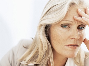 Headshot of tired looking woman