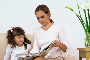 Mother and daughter reading