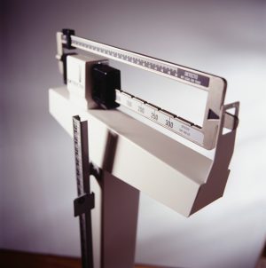Close-up view of medical scale to measure height and weight