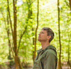 Man standing in a forest