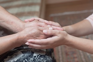 Young hands holding old hands