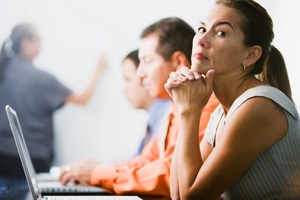 woman-daydreaming-in-class