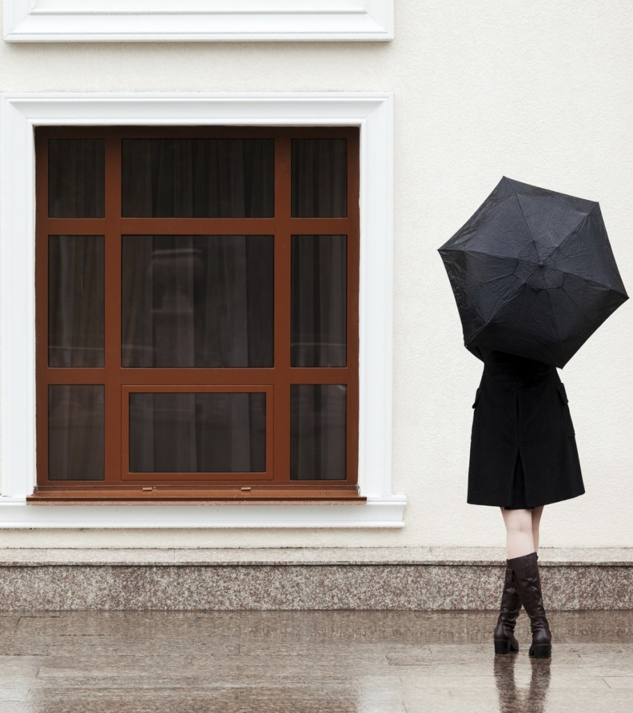 Woman with umbrella in the rain