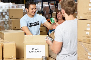 Volunteer collecting food donations