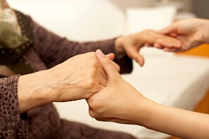 holding-hands-comforting-listening-0614136