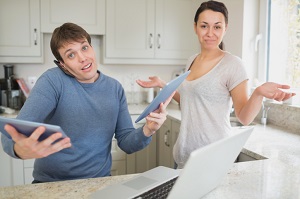 Man works while his partner waits